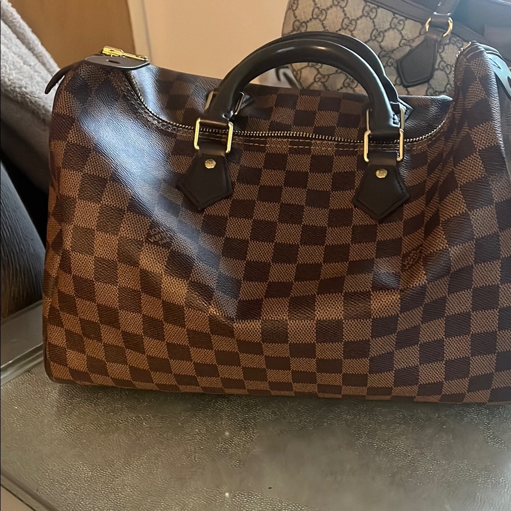 Louis Vuitton Brown Duffel Bag with Classic Checkered Pattern